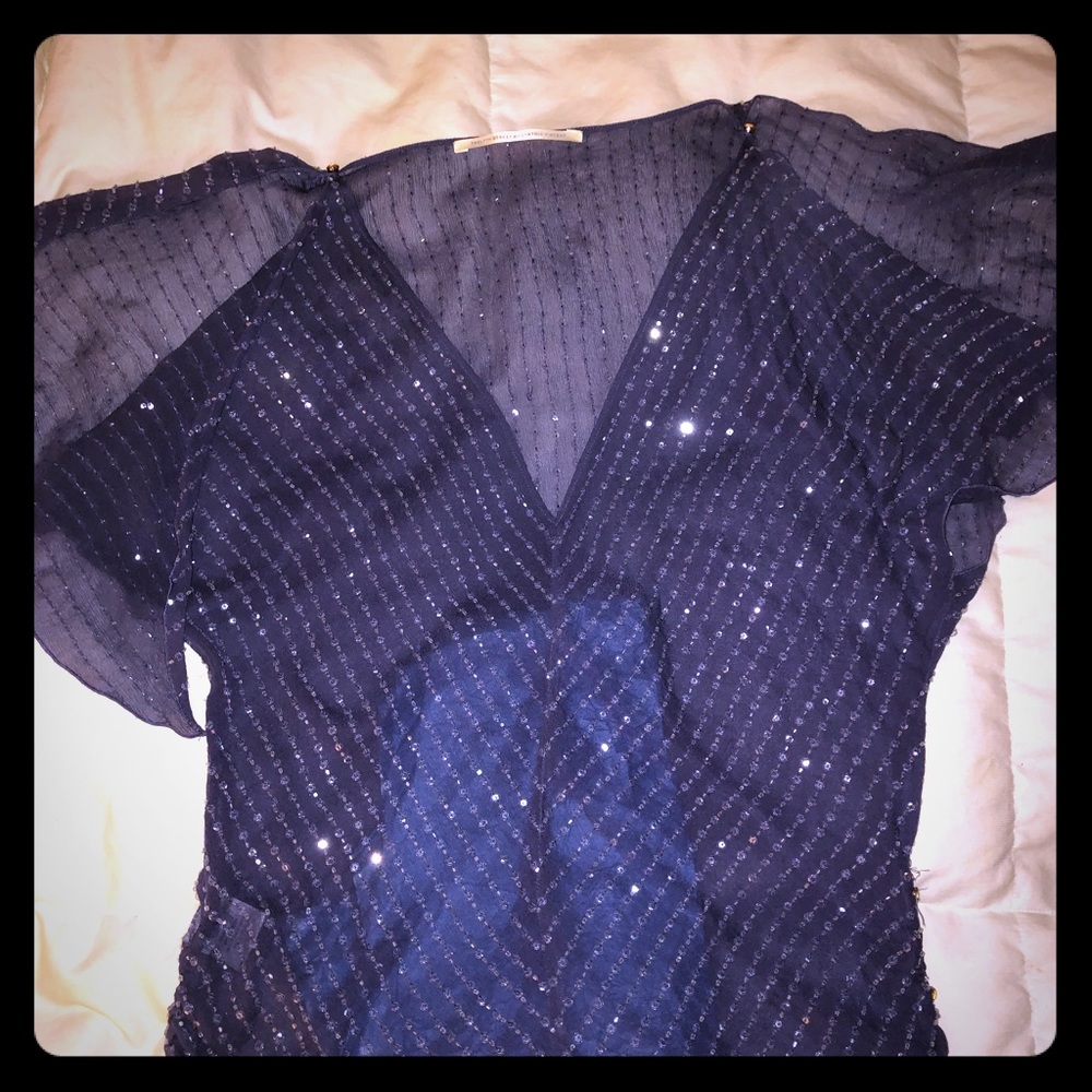 Evening top with split sleeves.